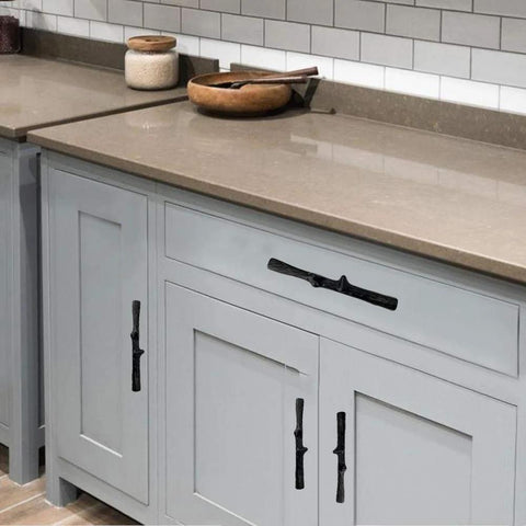 8 Pack Black Twig Branch Cabinet Knobs and Rustic Drawer Pulls Set installed on a gray farmhouse kitchen cabinet.