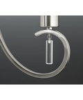 Detail of metal curvature on Four Light Pendant in Brushed Nickel finish with white silk Mylar shade, 20-inch light.