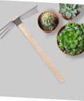 Dual Head Cultivator Garden Hoe For Lightweight Outdoor Yard Work Portable Sturdy Metal Garden Tool next to potted succulents