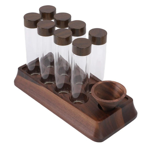 Slay Your Kitchen Game With This Top Shelf Airtight Coffee Bean Cellar Featuring Durable Walnut Wood And Sleek Glass Tubes To Lock In Peak Freshness For Serious Baristas, featuring nine glass tubes on a walnut wood stand.