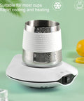 Solid Desk Companion Electric Beverage Warmer Keeps Your Morning Brew Piping Hot With Dead Simple USB Powered Convenience Smooth Thermal Plate For Any Standard Coffee Mug Or Tea Cup Leveling Up Your Sip Game on desk with stainless steel cup.