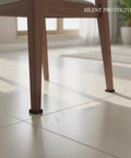 Chair on tile floor with Thickened Furniture Leg Caps Protectors For Hardwood And Tile Floors Slip On Chair Glides