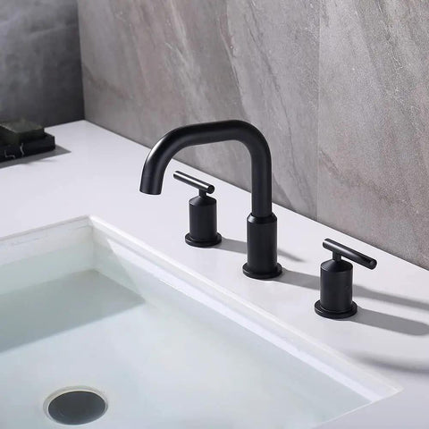8 Inch Two Handle Widespread Matte Black Bathroom Faucet with 360 Swivel Spout for 3 Hole Sinks, installed, showing handles and spout