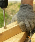 Person using 17 Piece SDS Plus Rotary Hammer Drill Bits And Chisels Set For Concrete And Masonry with gloved hand