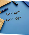 Ultimate Pegboard Hooks Set For Garage Wall Organization, Movable Layout To Fit Hand Tools And Small Gear, Universal Tool Hangers For Home And Shop, Flexible Pegboard Rack System For Kitchen Studio And Retail Displays black plastic hooks on blue board