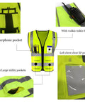 Top Shelf High Visibility Reflective Safety Vest With Heavy Duty Zipper And Deep Storage Pockets Custom Business Logo shown with interphone and ID pockets.