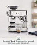 Absolute Game Changing Slick Espresso Machine In Damson Blue With Auto Milk Steaming Precision Tamping And Cold Brew Function For Smooth Latte Art And Major Home Cafe Vibes Touchscreen Daily on a countertop.