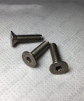 Badass Gr2 Titanium Countersunk Flat Head Screws, M2 Through M8 Metric Fine Thread Hex Socket Allen Bolts on white background.