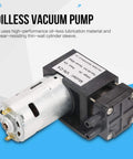 Mini Oil Free Vacuum Pump 24V DC -85 KPa Vacuum 40 Lpm Flow Oilless Design black and silver unit with labels