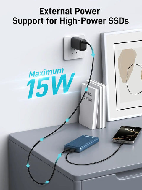 External power adapter connected to a heavy duty dual bay nvme enclosure, supporting high-power SSDs up to 15W.