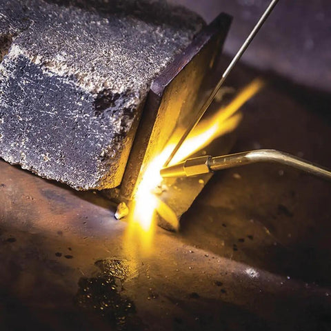 Heavy Duty Welding Torch With Adjustable Flame And Built In Igniter for MAPP Oxygen or Propane, brazing metal against brick surface