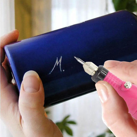 Corded Electric Engraver Pen With Stepless Speed 3000 To 15000 RPM Pro Grade Etching Tool Kit engraving on blue metal surface