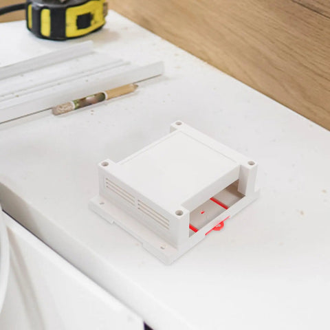 Flame Retardant ABS Junction Box for Wall Mounted Outlets and DIY Control Panels, indoor outdoor use, white plastic enclosure on table