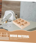 Six Compartment Wood Jewelry Tray With Multi Grid Layout For Rings And Bracelets Rustic Countertop Trinket Dish Keeps Your Bling Secure And Neat on a desk.