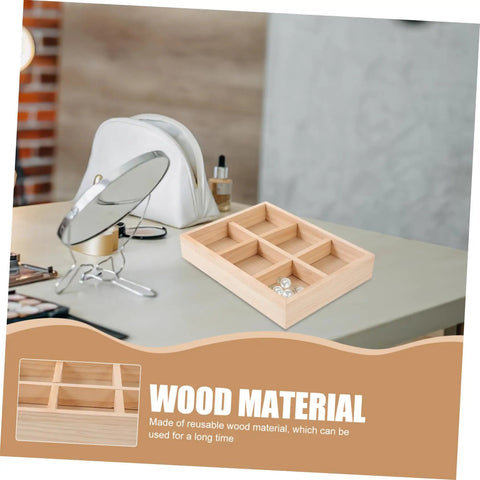 Six Compartment Wood Jewelry Tray With Multi Grid Layout For Rings And Bracelets Rustic Countertop Trinket Dish Keeps Your Bling Secure And Neat on a desk.
