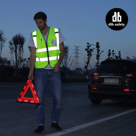 Person wearing High Visibility Reflective Safety Vest For Men And Women, ANSI Class 2, Yellow With Durable Zipper at roadside, Size L.