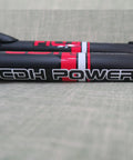 Close-up of black CDH Power emblem on beefy 26 inch front suspension fork with 1 inch threaded steerer, disc brake ready, black finish.