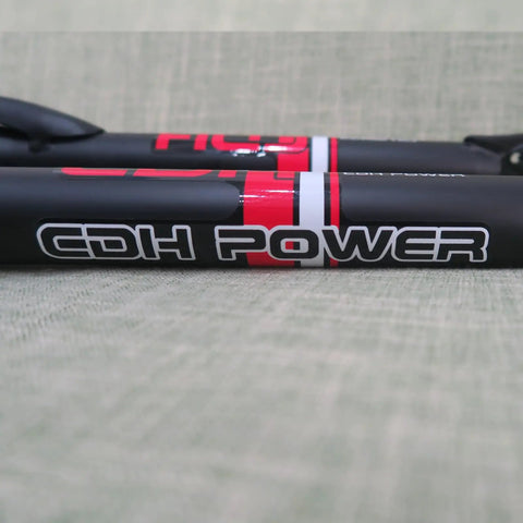Close-up of black CDH Power emblem on beefy 26 inch front suspension fork with 1 inch threaded steerer, disc brake ready, black finish.