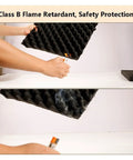 Killer Self Adhesive Egg Crate Acoustic Foam Panels 2 CM Thick being tested for flame retardant safety.