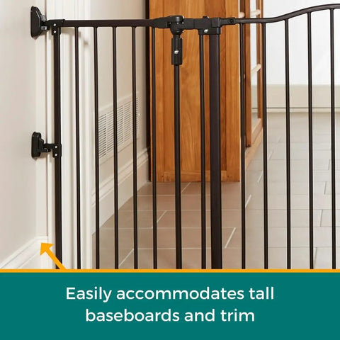 Extra Wide Windsor Arch Walk-Through Pet Gate 38.3 To 72 Inches Wide, 30 Inches Tall, Matte Bronze gate installed on wall