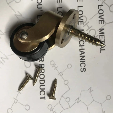 Antique Style Brass Caster Wheels Set, 25mm Beefy Heavy Duty Swivel Casters With Screws, 360 Degree Rotation displayed on surface
