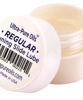 Front view of tuning slide lube jar, white plastic container with screw cap, 9 ml