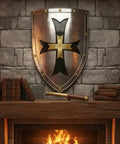 Medieval Crusader Steel Shield Beefy 18 Gauge Armor displayed over a fireplace, Templar design, handcrafted for warriors