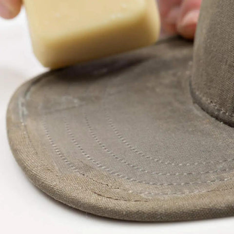 Applying Heavy Duty Fabric Wax Bar For Waxed Canvas Jackets Bags And Shoes Keeps Your Gear Dry With Weatherproof And Water Repellent