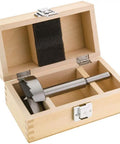 Open wooden box displaying a bit from the Eight Piece Forstner Bit Set Including 2-1/4 Inch, 2-3/8 Inch, and other sizes.
