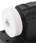 Versatile Oreilet Mini Bench Grinder With Dual Wheels Offers Adjustable Speeds Up To 6000 Rpm showing white grinding wheel detail.