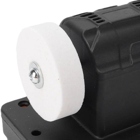 Versatile Oreilet Mini Bench Grinder With Dual Wheels Offers Adjustable Speeds Up To 6000 Rpm showing white grinding wheel detail.