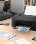 Slick Wireless All In One Home Office Printer Scanner Copier on a desk, compact design printing documents among stationery.