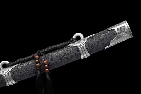 Close-up of ornate scabbard of Hand Forged Qing Dynasty Dao Sword With High Manganese Steel Blade And Alloy Fittings Wood Scabbard Wrapped In Faux Leather