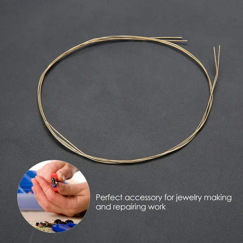 Soldering Wire Pro Grade Low Melting Point for Jewelry Making and Copper Welding shown in a coiled position on dark background.
