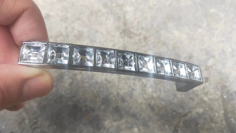 Close-up of Six Pack U Shape Crystal Glass Drawer Pull Knob with Zinc Alloy Base and Shiny Silver Handle