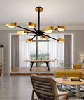Modern Adjustable Pendant Chandelier With Gold Triangle Design For Dining Bedroom Living Room Kitchen Dope Brass Finish in a bright room.