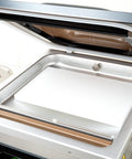 Pro Grade Chamber Vacuum Sealer Packs A Solid Punch With Sturdy 16 Inch Seal Bar And Whisper Quiet Motor, open view.