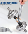 Applying Beefy Heavy Duty Waterproof Duct Tape 1.88 Inch Wide By 35 Yards Strong Adhesive to metal dumbbell