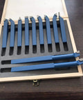 Top Shelf 11 Piece Tungsten Carbide Lathe Turning Tool Set With Heavy Duty Boring Bars And Roughing Grooving Inserts Built Tough, displayed in a wooden case.