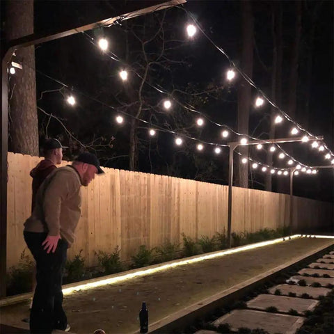 Outdoor Globe String Lights Hanging Kit With 164ft Black Vinyl Coated 304 Stainless Steel Cable in backyard setting