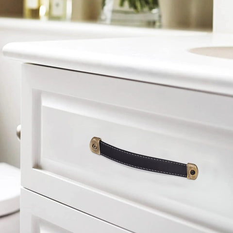 Two Pack Black Leather Drawer Handles With Mounting Screws For Cabinets, Drawers, Trunks And Suitcases installed on white drawer