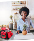 Top Shelf Electric Knife Sharpener For Kitchen Blades And Drill Bits Quick Multi Function Tool placed on countertop with a smiling woman holding a pineapple.
