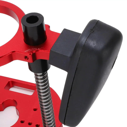 Level Up Your Woodworking Setup With This Heavy Duty Aluminum Router Lift Base offering micrometer control, featuring red anodized aluminum and clamp.