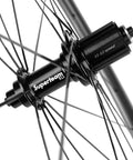 Close-up of Superteam hub on Kickass Tubeless Ready Carbon Fiber Wheelset For 700c Road Bikes Toray T700 Build UCI Approved