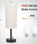 Set Of 2 Fully Dimmable Bedside Lamps With USB C Charging Port And Built In USB Ports And Outlets shown with beige shade and included bulbs