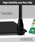 Close-up of Helping Hands Soldering Station With Four Flexible Arms and Clamps, showing heavy-duty steel base and PCB.