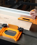 Tandem Featherboard And L Push Stick Safety Kit being used on a table saw with wood. Includes T-slot bolts for secure positioning.