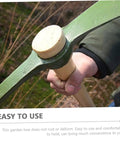 Close-up of steel gardening pickaxe handle digging tool for vegetable farming and outdoor yard work durable garden hoe.