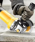 Badass 125mm Electric Angle Grinder With a Rock Solid 1050 Watt Motor and 11000 RPM cutting through concrete with precision.