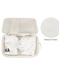 Interior of Two Pack Waterproof Diaper Bag Organizer Pouches With Hanging Pods showing clothes and waterproof fabric detail